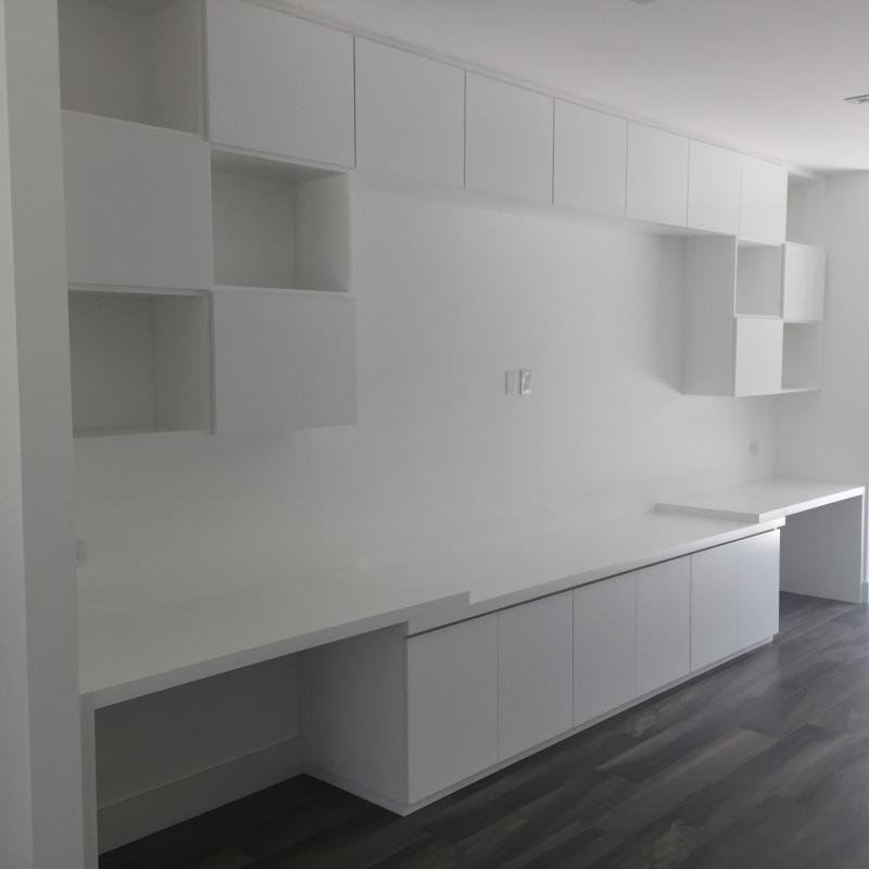 White custom built-in cabinets and desk